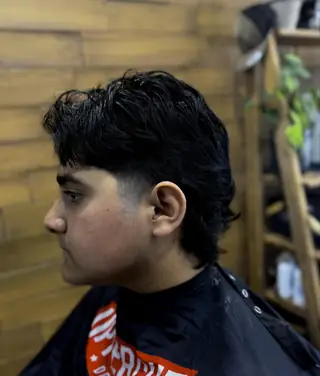 Modern mullet with a dark fade